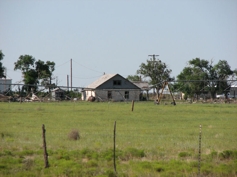 A telephoto view of the ranch, seen from the road